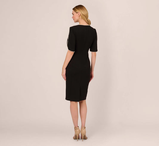 roselledress closed back black crepe sheath dress pearl edged cape sleeve back slit mother of the bride formal wear back view
