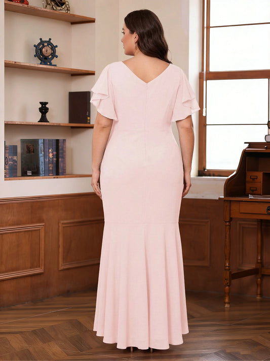 Blush pink plus size formal mother of the bride dress with V-back and center zipper