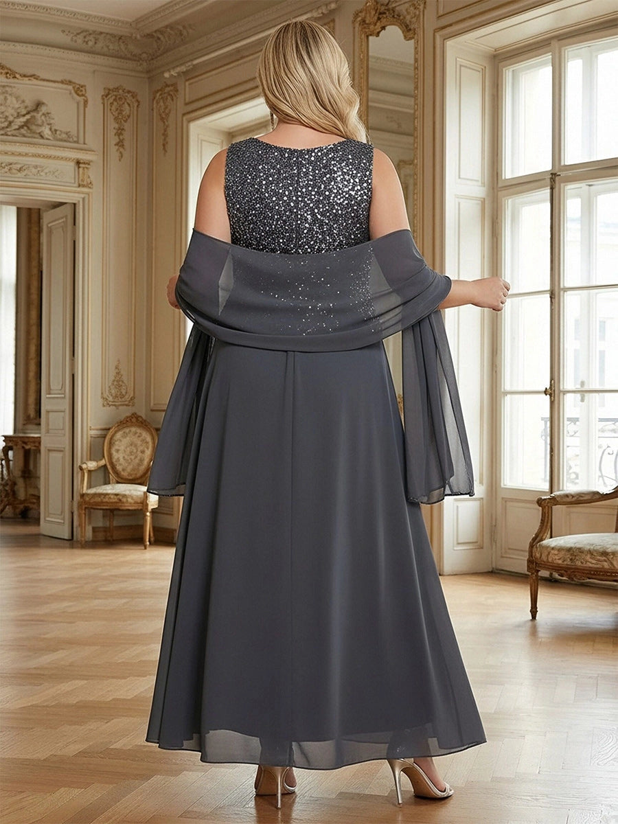 Model wearing roselledress charcoal‑grey plus‑size sequin chiffon wedding guest dress zipper‑back rear view with chiffon shawl