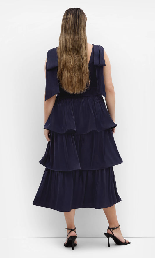 Roselle Dress plus size navy satin formal midi dress, large bow‑back tiered ruffle gown back view