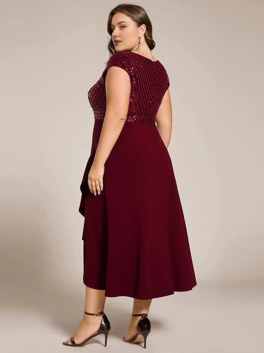 Burgundy plus size midi dress back view, V-back, sequin bodice, cap sleeves, center back zipper and asymmetrical midi skirt