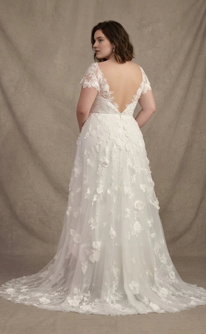 Ivory plus size wedding dress with deep V-back, sheer lace cap sleeves, floral appliques and elegant lace-trimmed train