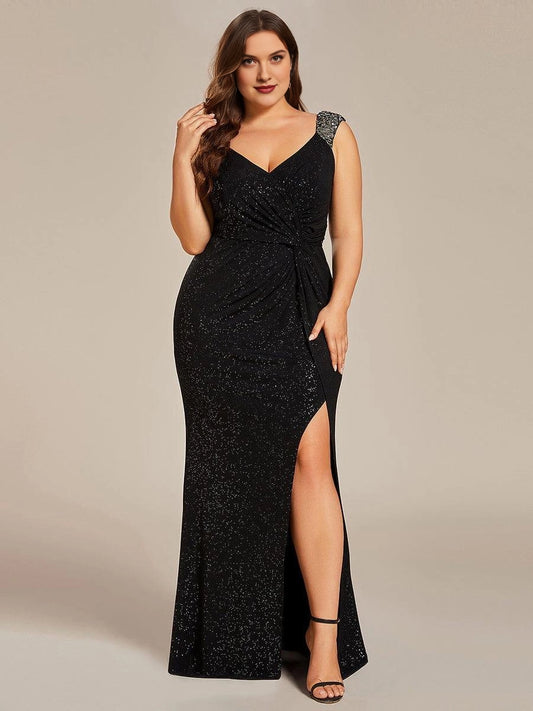 Plus size black glitter prom dress with V-neck, beaded shoulder straps, twisted ruched waist, front high slit and mermaid floor length skirt, front view