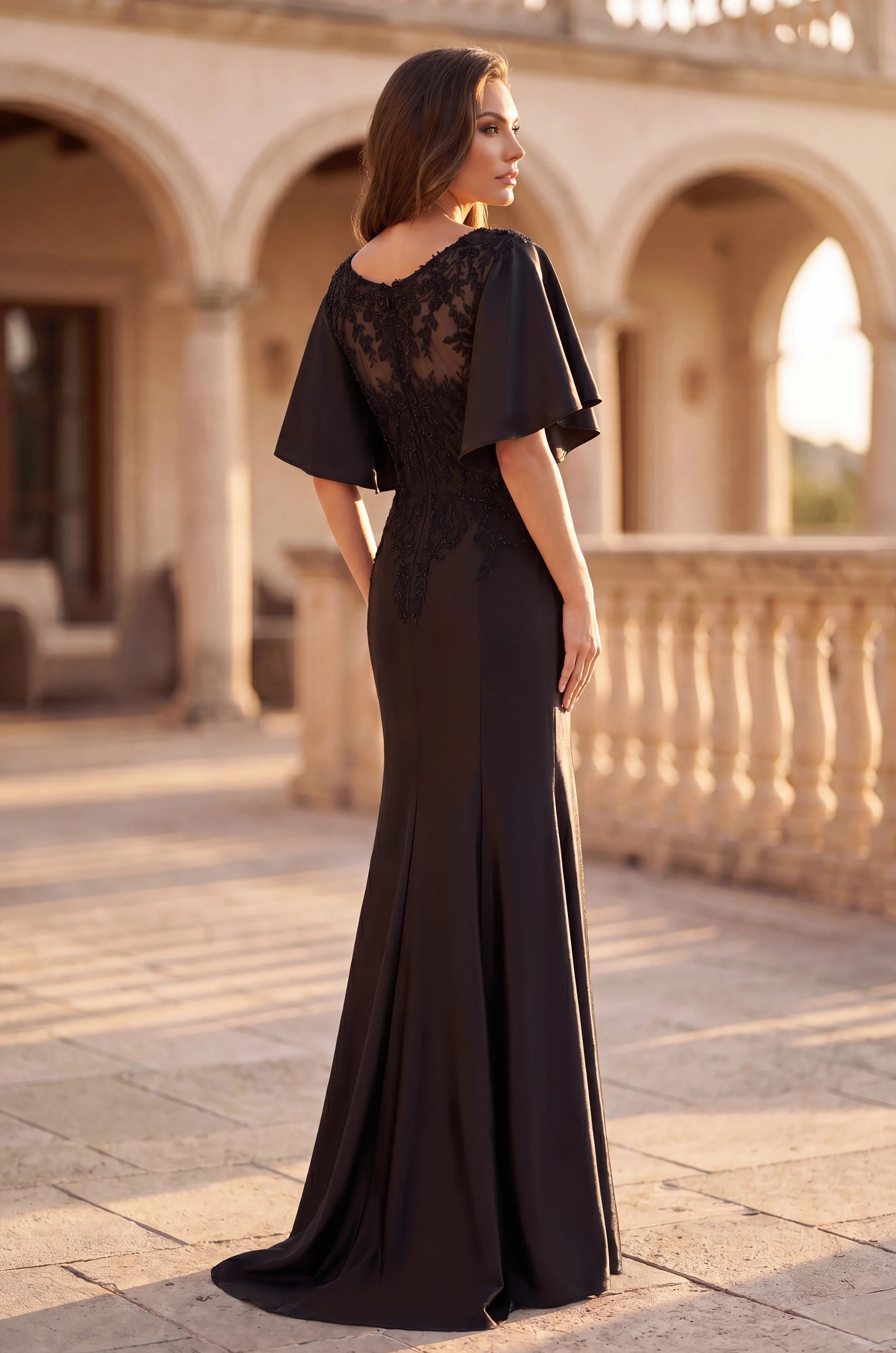 roselledress sheer illusion back black satin mermaid gown floral lace embroidered flutter sleeve mother of the bride formal wear back view