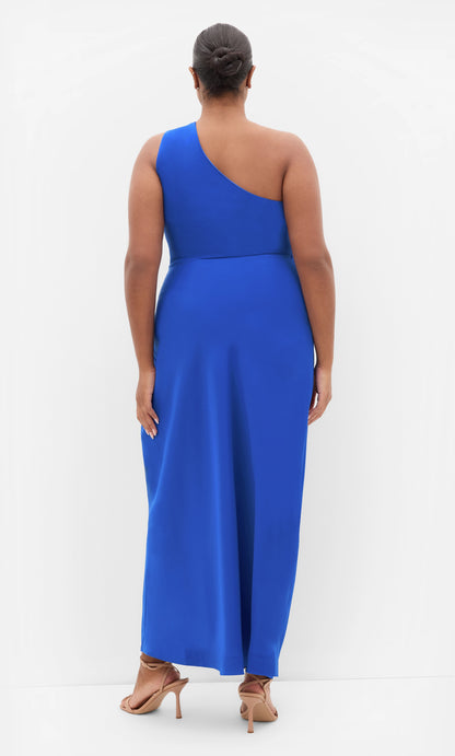 RoselleDress cobalt blue plus size formal wedding guest gown clean one‑shoulder open back wrap maxi skirt back view