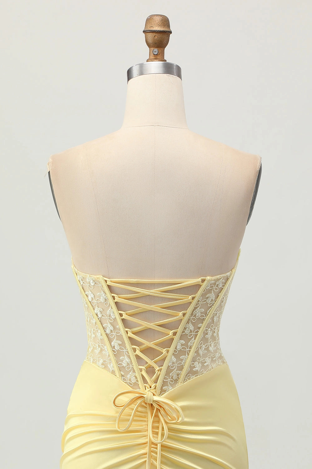 Pale Yellow Bodycon Cowl Strapless Lace Up Back Mini Homecoming Dress