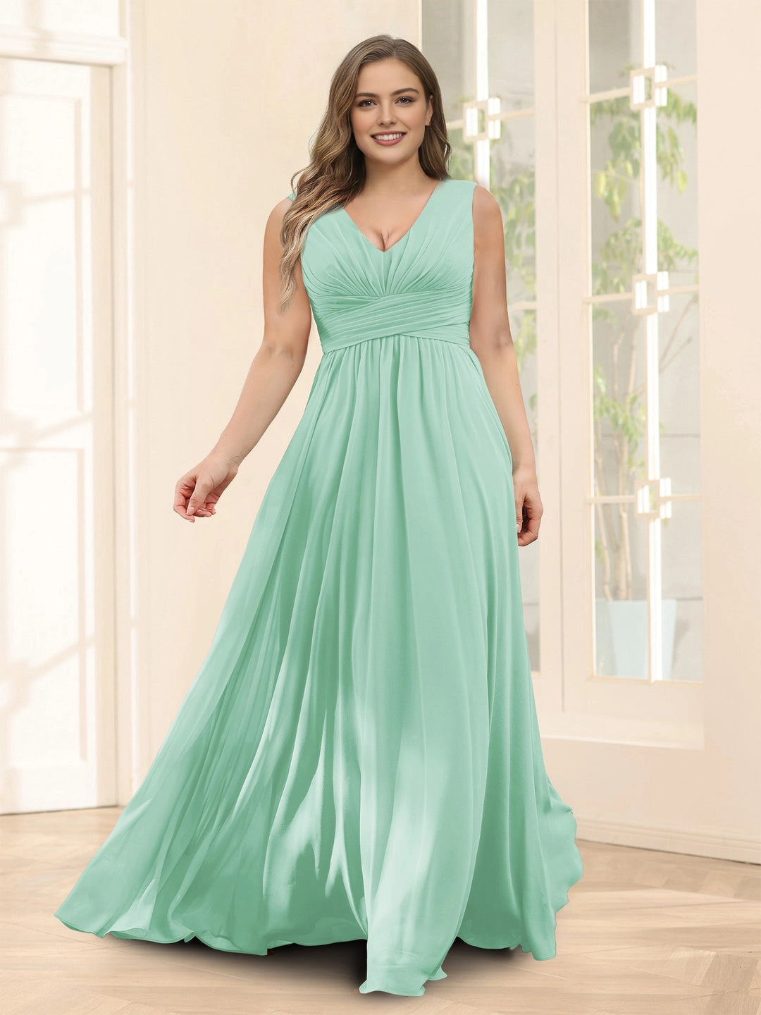 Plus‑Size Sleeveless V‑Neck Empire Waist Chiffon A‑Line Floor‑Length Wedding Guest Dress
