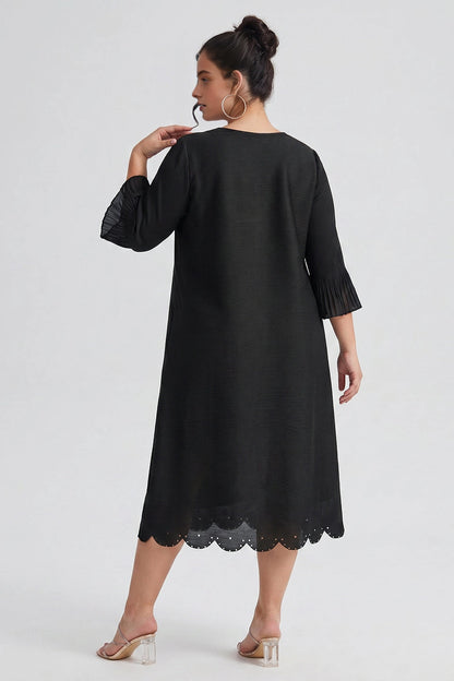 back view black curvy loose midi dress solid plain back scalloped hem textured fabric mom party dress