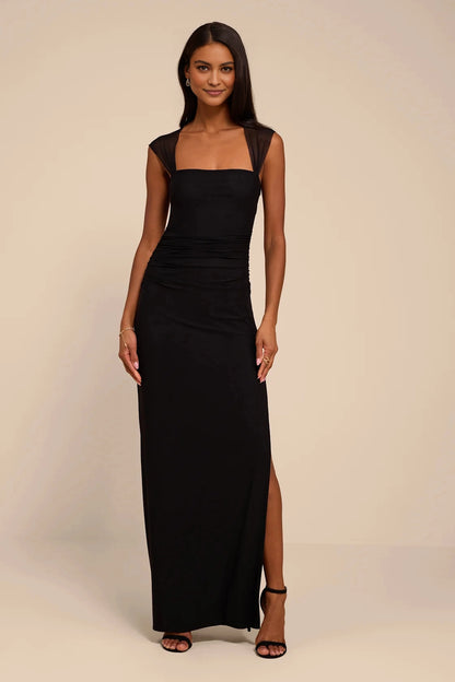 roselledress solid black matte stretch knit sheer mesh cap sleeve square neck waist side vertical ruched high thigh slit long maxi evening gown neutral beige studio front full shot