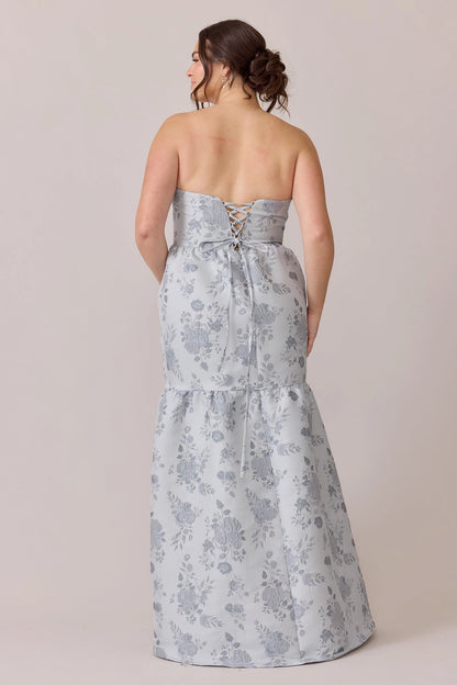 Dusty blue brocade plus size long dress back view, strapless neckline, lace-up corset tie back and tiered ruffle hem
