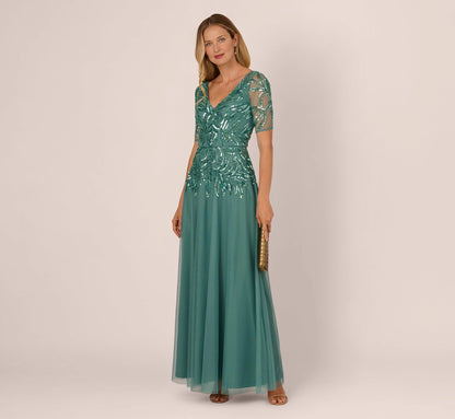 roselledress deep v back teal tulle evening gown sequin embroidered elbow sleeve mother of the bride dress back view
