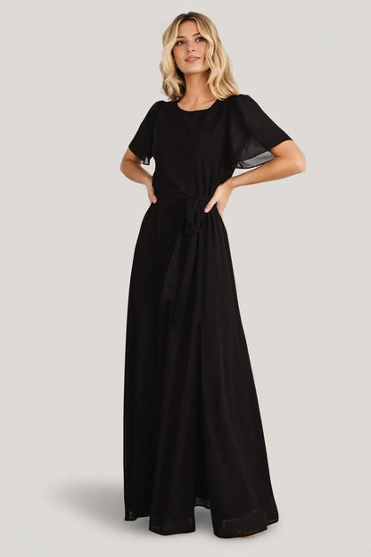 Roselledress black chiffon bridesmaid dress round neck flutter sleeve tie waist slit maxi front view