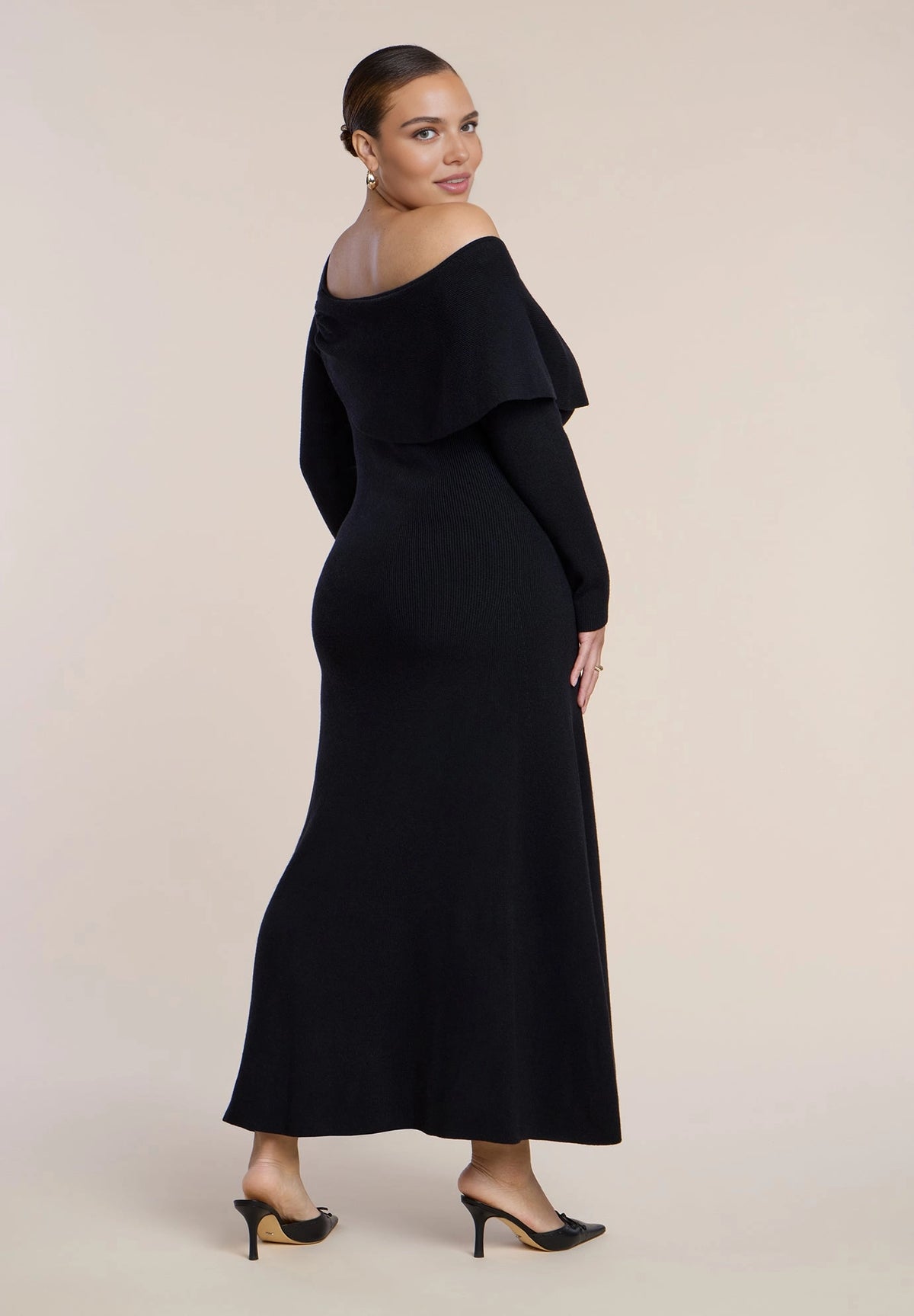 roselledress black plus size mermaid knit maxi dress off‑the‑shoulder fold over neck long sleeve evening gown back view
