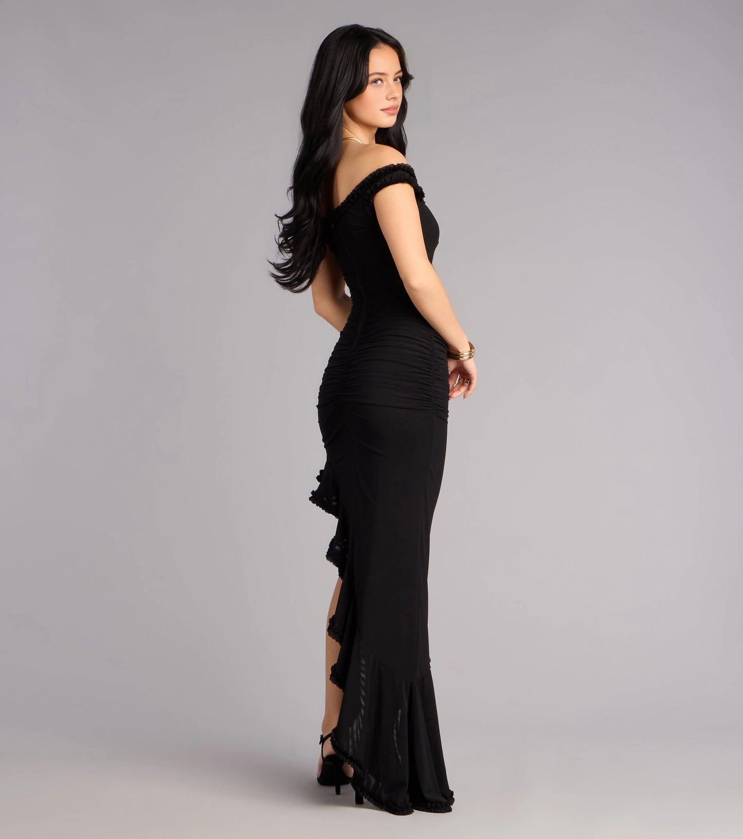 Back view RoselleDress black off shoulder ruched mermaid gown ruffle hem floor length wedding guest dress