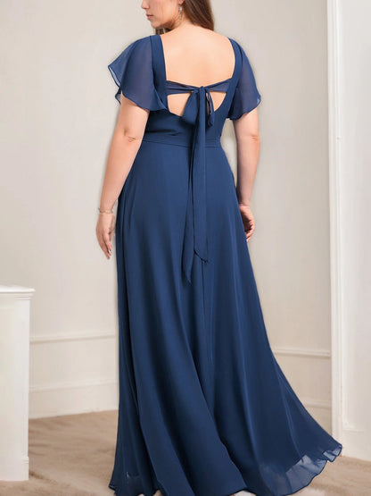 Back view of RoselleDress dark blue curvy chiffon evening dress square cutout tie bow back ruffle sleeve long bridesmaid maxi dress