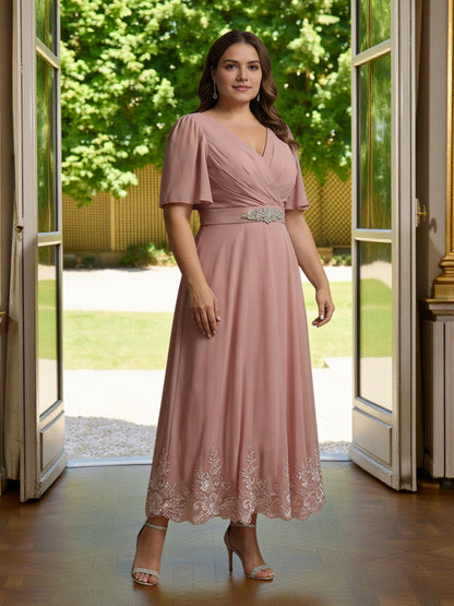 Roselledress dusty pink plus size mother of the bride dress front view, flutter sleeve embroidered hem a‑line midi gown