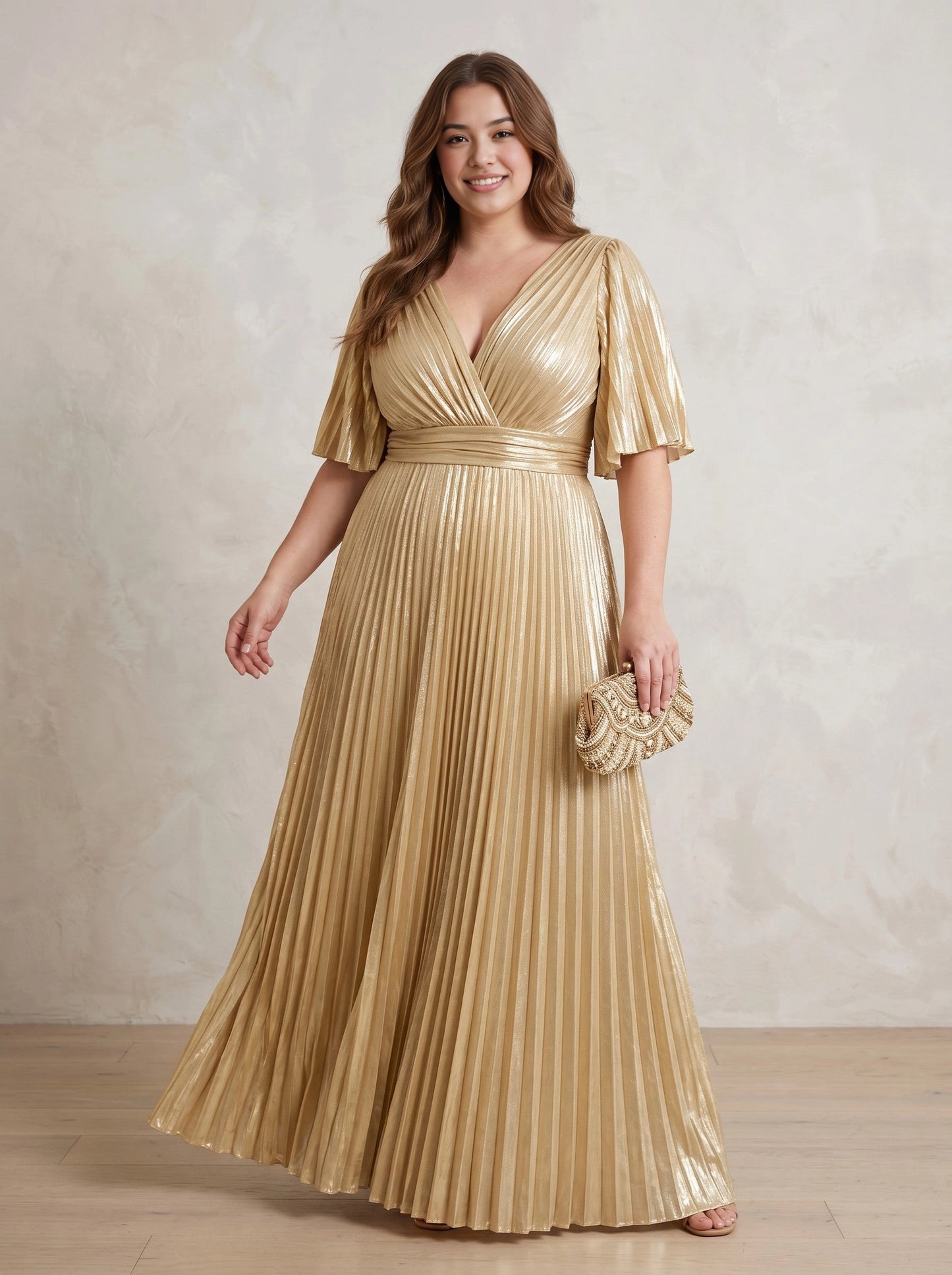 Roselledress gold metallic pleated plus size mother of the bride dress front view, wrap v neck flutter sleeve floor length formal gown