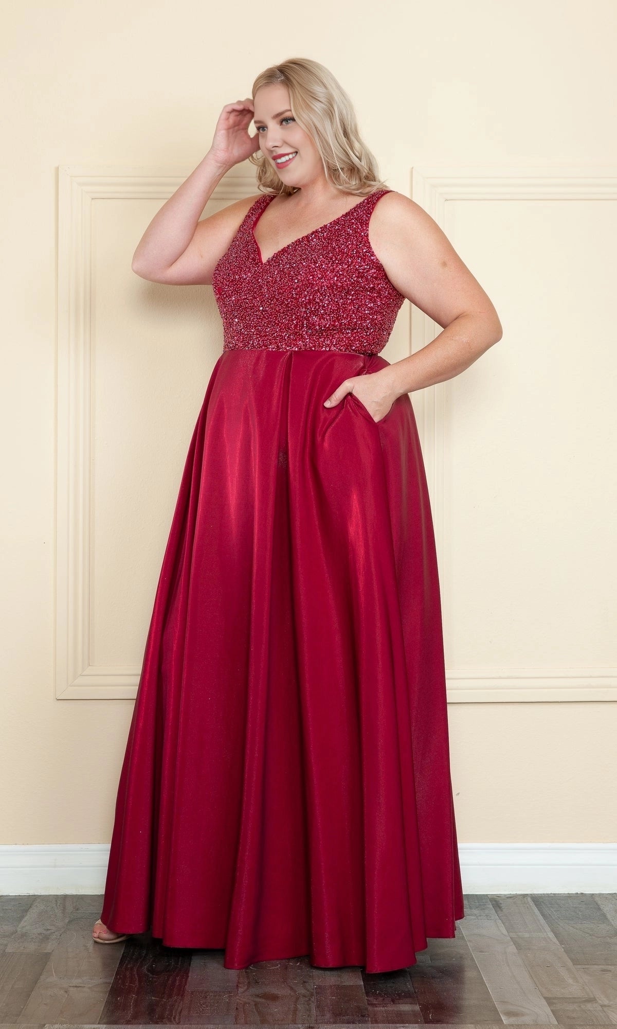 Roselledress burgundy plus size prom dress front view, sleeveless beaded bodice a-line gown with side pockets