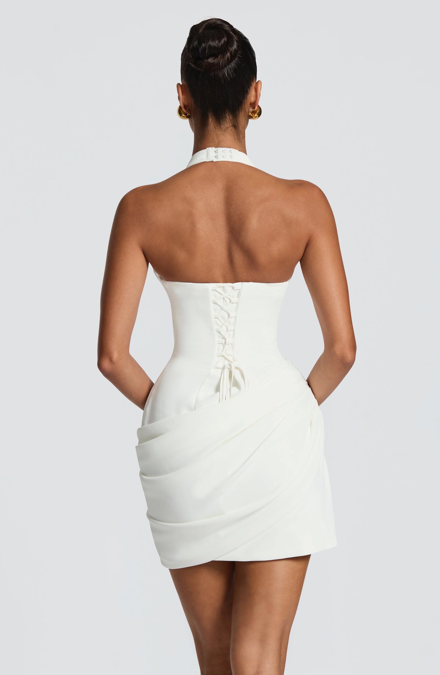 roselledress white halter lace up back draped mini formal dress back view