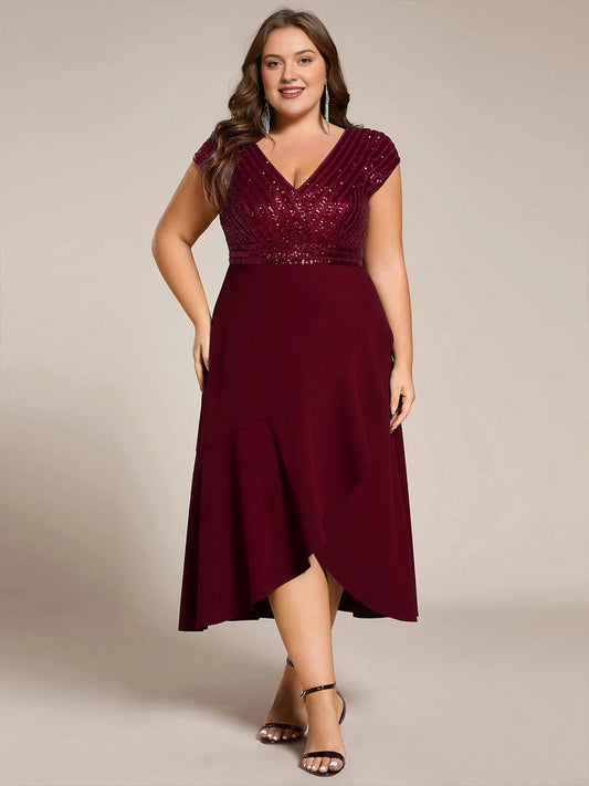 Plus size burgundy sequin bodice mother of the bride dress with V-neck, cap sleeves, fitted waist and asymmetrical tulip midi skirt, front view
