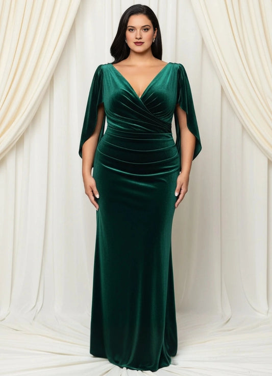 Plus size emerald green velvet mother of the bride dress with V-neck wrap bodice, cape sleeves, ruched waist and mermaid floor length skirt, front view
