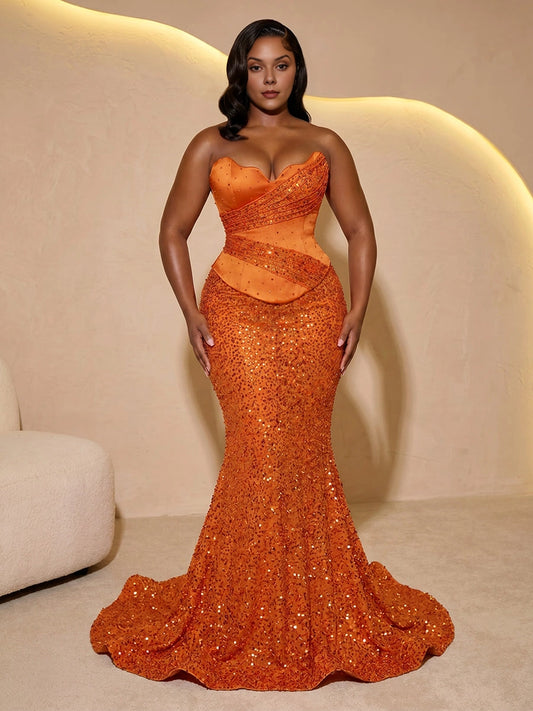 Plus size orange sequin mermaid evening dress with a strapless sweetheart neckline