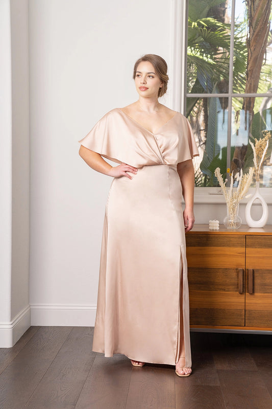 Champagne plus size satin bridesmaid dress with wrap V-neckline, flutter sleeves and flowing A-line floor-length skirt by roselledress