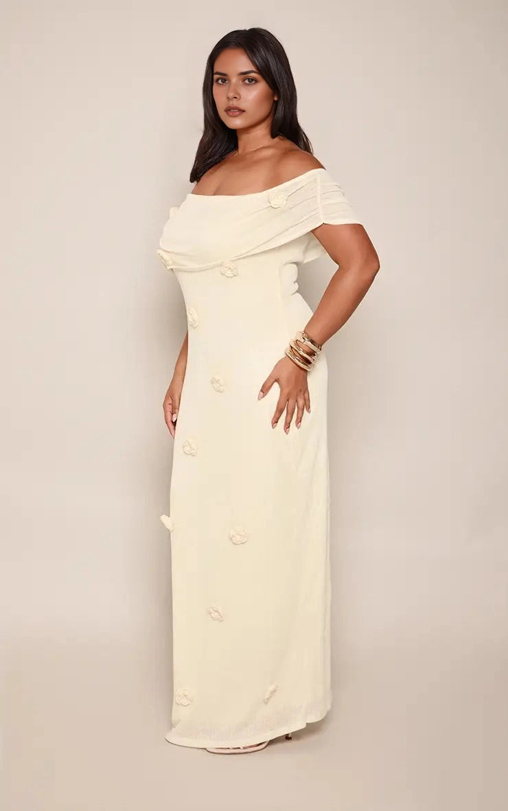 Roselledress plus size cream off‑the‑shoulder column maxi wedding guest dress with 3D floral appliqué front view on curvy model