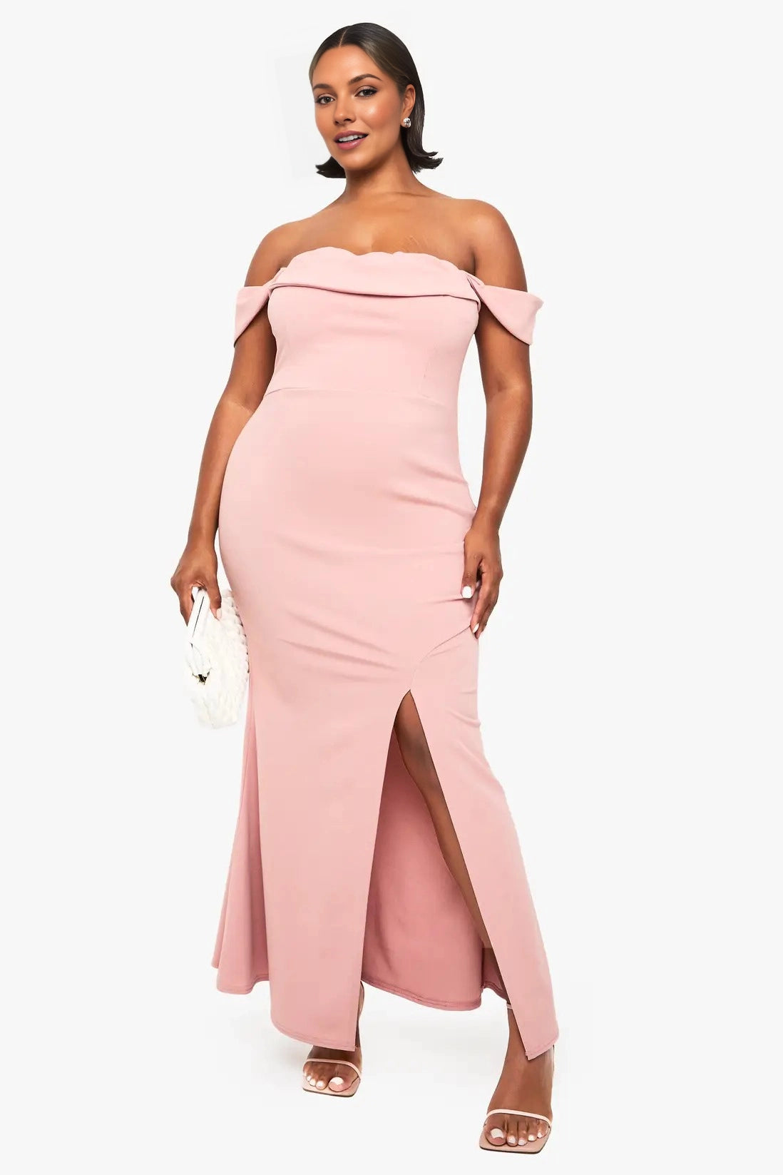 Roselledress plus size dusty pink off‑the‑shoulder mermaid maxi wedding guest dress with front thigh slit front view on curvy model