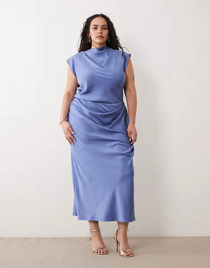 Roselledress plus size blue satin draped cowl neck cap sleeve midi wedding guest dress front view on curvy model