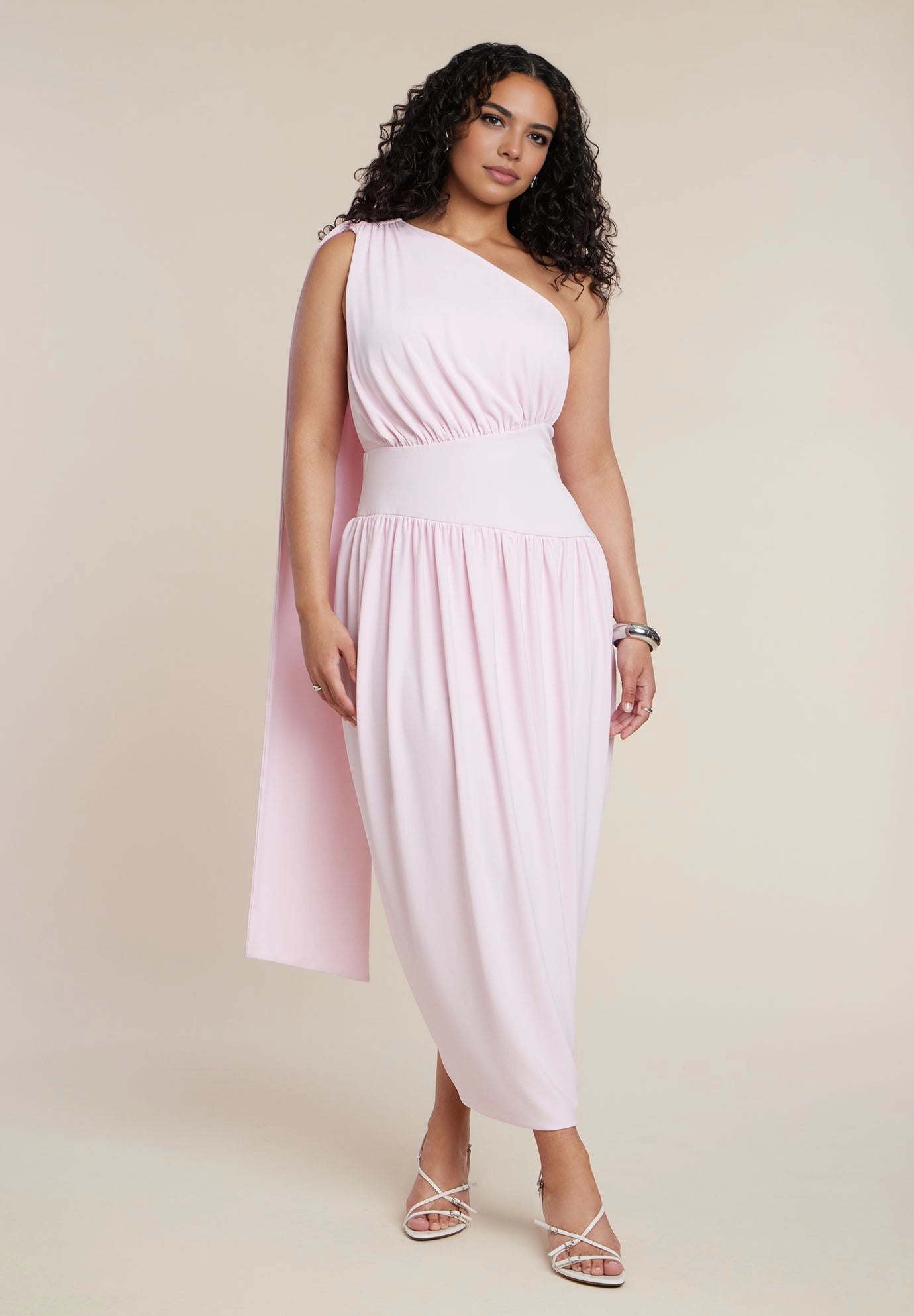roselledress blush pink plus size one‑shoulder cape midi dress draped waist tulip skirt wedding guest formal dress front view