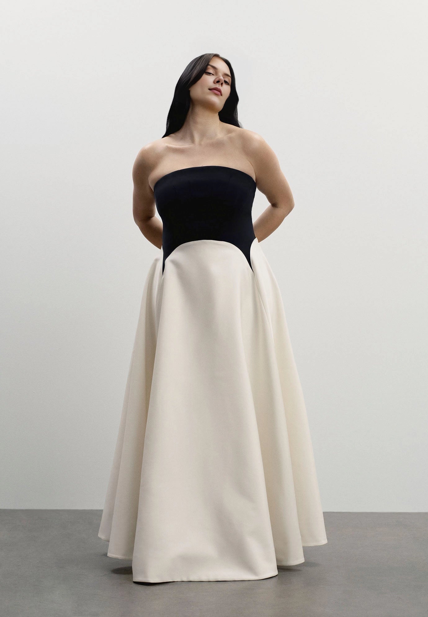 Roselle Dress plus size black‑white color‑block maxi wedding guest dress, strapless geometric cut a‑line full skirt front view, evening gown