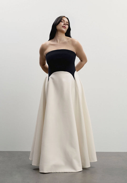 Roselle Dress plus size black‑white color‑block maxi wedding guest dress, strapless geometric cut a‑line full skirt front view, evening gown