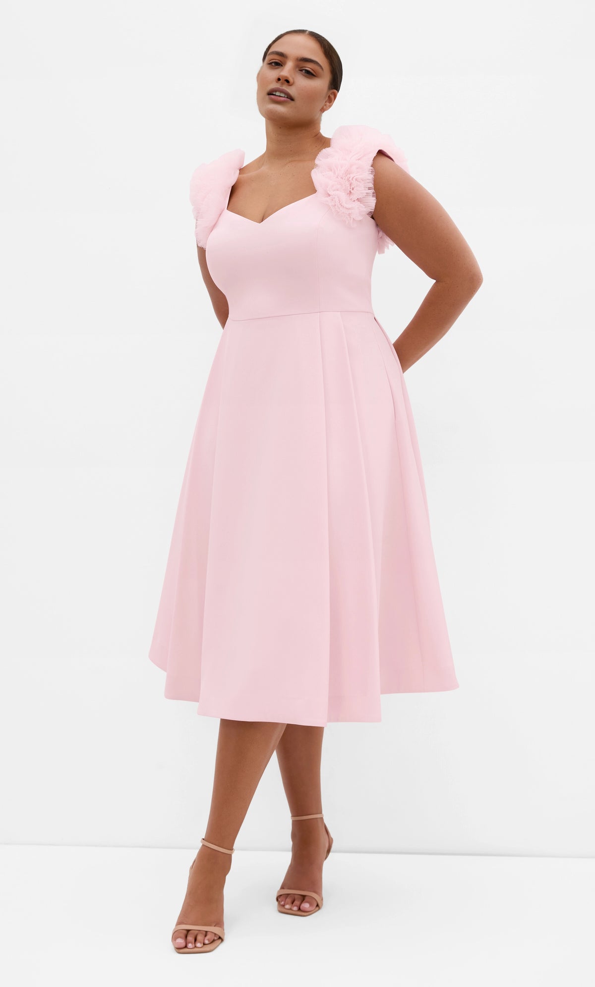 Roselle Dress plus size blush pink wedding guest dress, sweetheart neck, tulle ruffle shoulder straps, a‑line midi gown front view