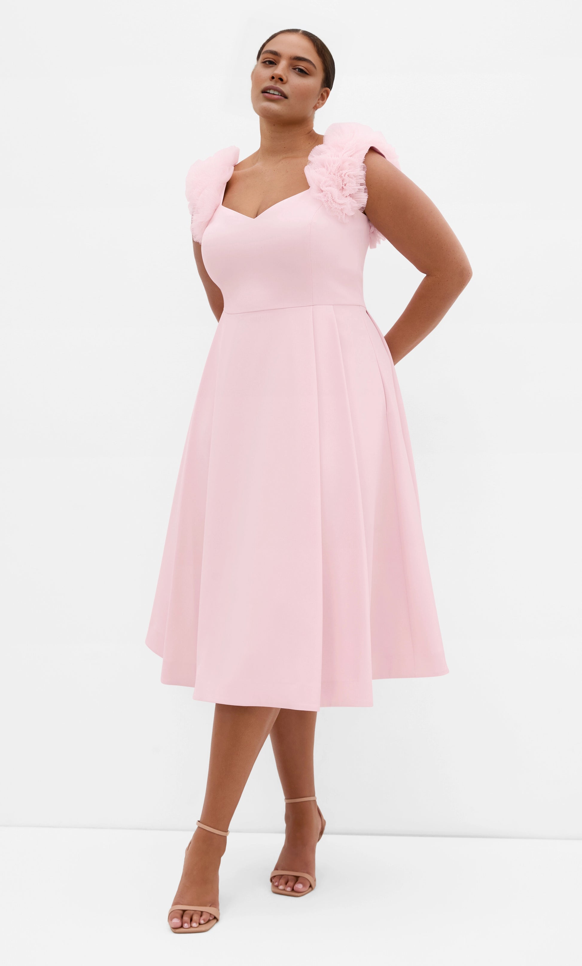Roselle Dress plus size blush pink wedding guest dress, sweetheart neck, tulle ruffle shoulder straps, a‑line midi gown front view