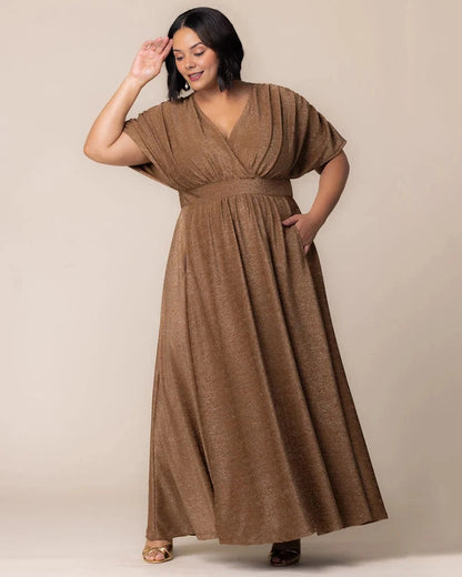 Roselle Dress plus size bronze shimmer maxi wedding guest dress, v‑neck dolman short sleeve elastic waist flowy skirt front view, evening gown