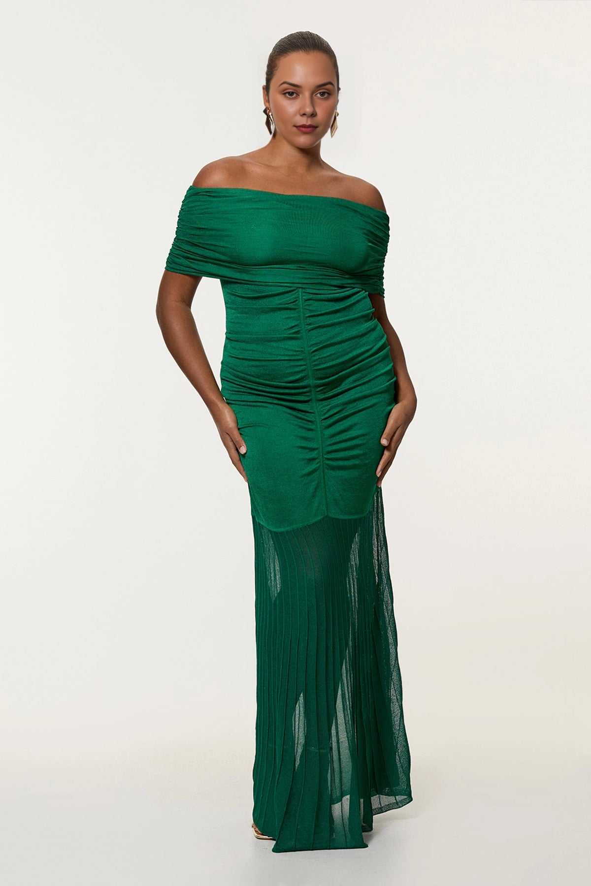 Roselle Dress plus size green off‑the‑shoulder maxi wedding guest dress, ruched bodice pleated mesh skirt front view, evening gown