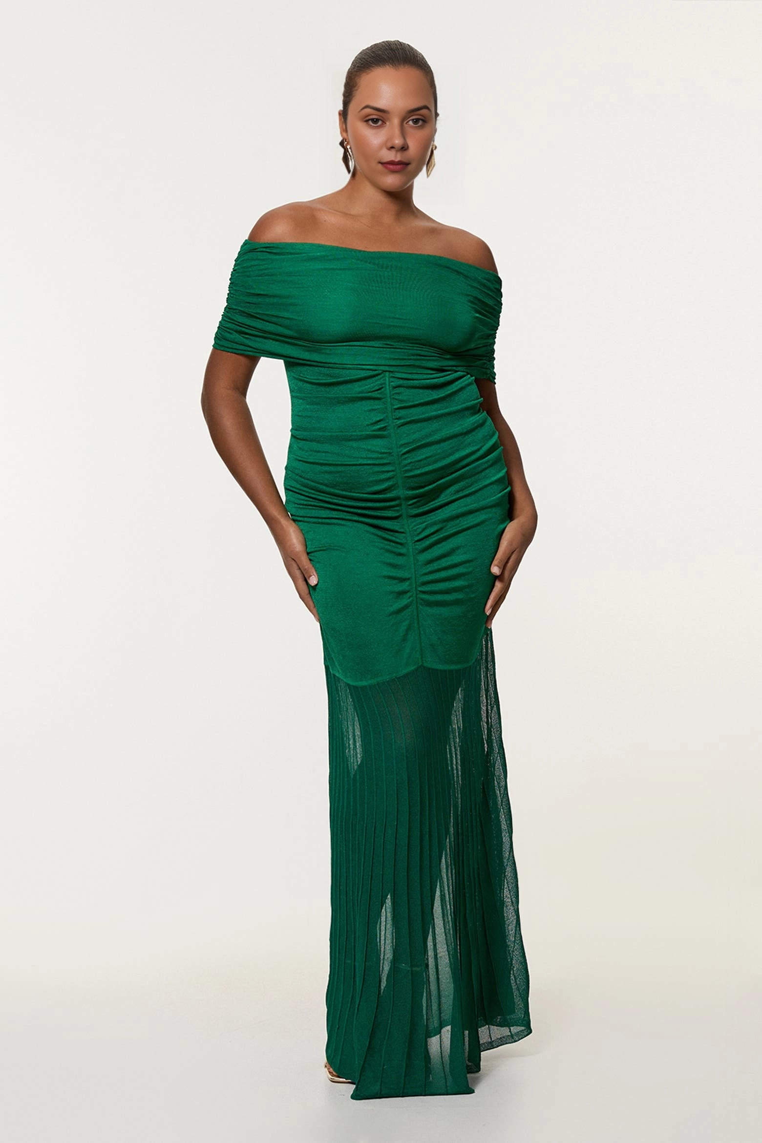 Roselle Dress plus size green off‑the‑shoulder maxi wedding guest dress, ruched bodice pleated mesh skirt front view, evening gown