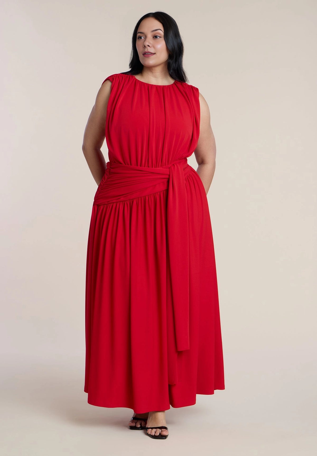 Roselle Dress plus size red jersey round neck sleeveless tie waist maxi wedding guest dress front view with side pockets