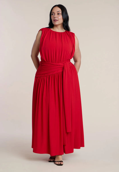 Roselle Dress plus size red jersey round neck sleeveless tie waist maxi wedding guest dress front view with side pockets