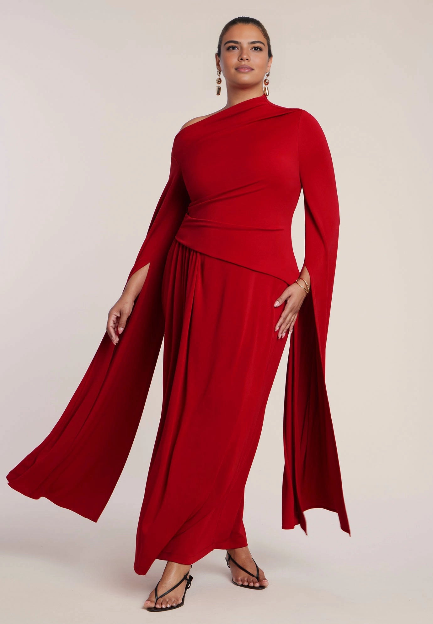 roselledress red glamorous plus size wedding guest dress asymmetric cold shoulder cape sleeve column maxi gown front view